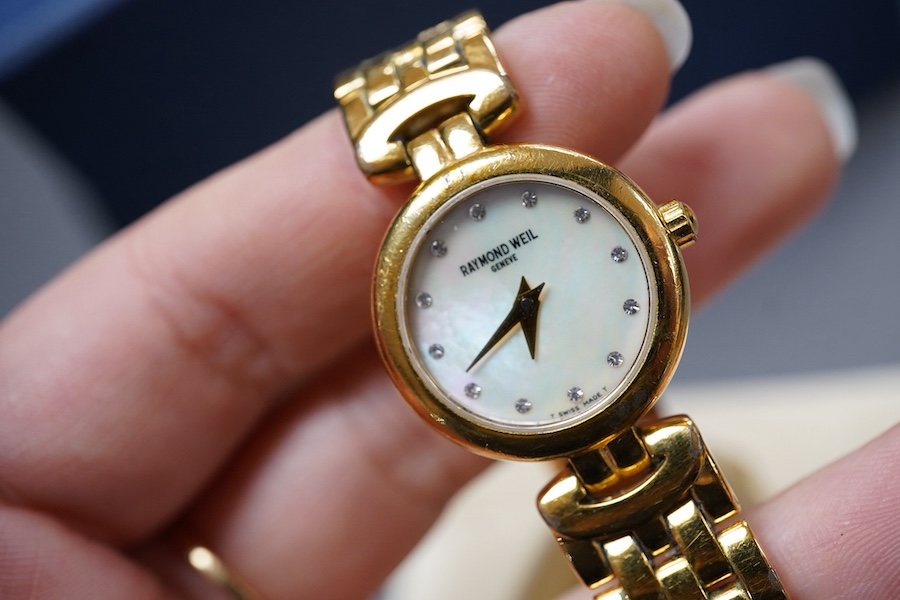 A lady's 2002 gilt steel Raymond Weil quartz wrist watch, with mother of pearl dial and simulated diamond dot numerals, with box and papers.